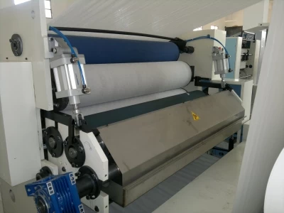 TOILET PAPER AND TOWEL MACHINE