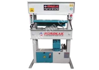 vehicle registration plate press