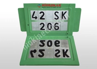 vehicle registration plate press