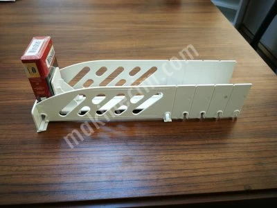 Cigarette shelf pusher. cigarette rack