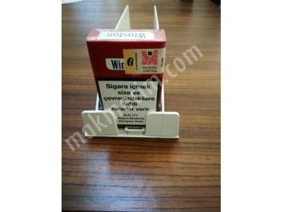 Cigarette shelf pusher. cigarette rack