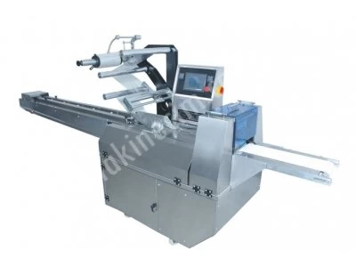 AUTO-FEED PACKAGING MACHINE