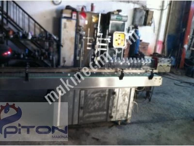 LIQUID OIL AUTOMATIC FILLING MACHINE WITH 4 NOZZLES WITH AUTOMATIC CONVEYOR SYSTEM