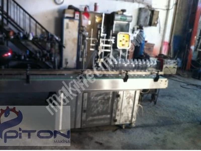 LIQUID OIL AUTOMATIC FILLING MACHINE WITH 4 NOZZLES WITH AUTOMATIC CONVEYOR SYSTEM