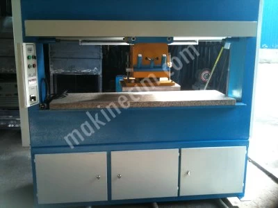 TRAVELING HEAD CUTTING PRESS