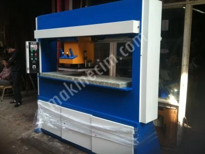 TRAVELING HEAD CUTTING PRESS