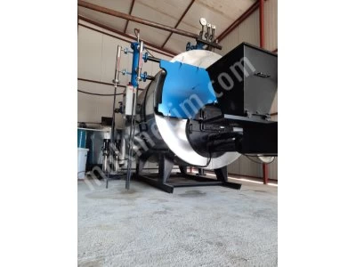1.500 Kg/H Katı Yakıtlı 6 Bar Otomatik Yüklemeli Buhar Kazanı