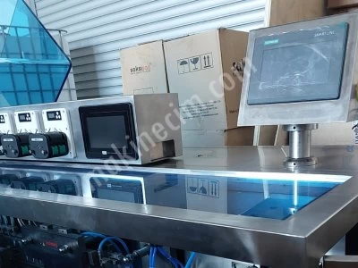 Yüksek Kaliteli Otomatik 0,3Ml / İ200Ml Sıvı Plastik Ampul Paketleme Makinası