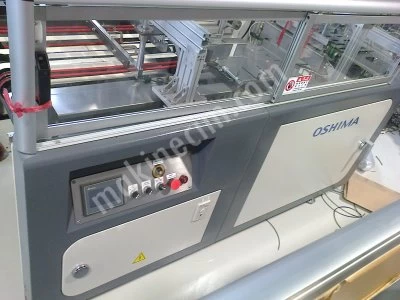 OFC 450 UNIVERSAL OSHIMA OFC 450 Streamlined Garment Folding and Bagging