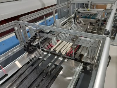OFC 450 UNIVERSAL OSHIMA OFC 450 Streamlined Garment Folding and Bagging