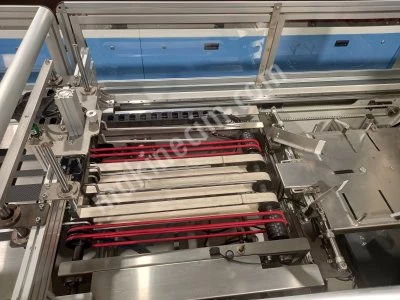 OFC 450 UNIVERSAL OSHIMA OFC 450 Streamlined Garment Folding and Bagging