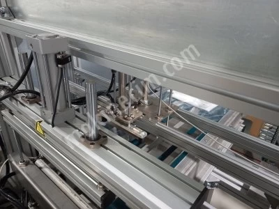 OFC 450 UNIVERSAL OSHIMA OFC 450 Streamlined Garment Folding and Bagging