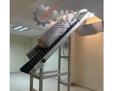 Eğimli Bantlı Konveyör – Merdiven ve Katlar Arası Yük Taşıma